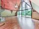 Large living room featuring floor-to-ceiling windows and spiral staircase at 1467 Shiloh Trail East Nw, Kennesaw, GA 30144