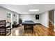 Basement with pool table, providing entertainment space alongside natural light from the windows at 1487 Monarch Ct, Marietta, GA 30062