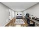 Basement bedroom complete with a bed, a workspace including a desk and chair, and neutral toned decor at 1487 Monarch Ct, Marietta, GA 30062