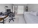 Bedroom setup as home office with modern desk, comfortable chair, and a relaxing daybed at 1487 Monarch Ct, Marietta, GA 30062