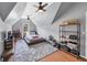 This bedroom features a platform bed, ceiling fan, sloped ceilings, and a gray rug at 1487 Monarch Ct, Marietta, GA 30062