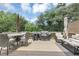 Outdoor deck with a grill, seating area, and patio furniture, perfect for entertaining at 1487 Monarch Ct, Marietta, GA 30062