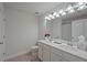 Bright bathroom with double vanity, white cabinets, and neutral finishes for a clean, modern look at 3735 Hazel Ave, Cumming, GA 30040