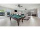 A clubhouse featuring a pool table, kitchen, and lounge area with tile flooring at 3735 Hazel Ave, Cumming, GA 30040
