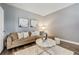Cozy living room with comfortable seating, stylish decor, and ample natural light at 3735 Hazel Ave, Cumming, GA 30040
