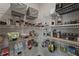Walk-in pantry with organized shelving offering ample storage for food and household items at 3735 Hazel Ave, Cumming, GA 30040