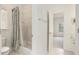 Bathroom features a bathtub and a view to a bedroom at 3820 Preserve Crossing Ln, Cumming, GA 30040