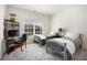 Bright bedroom with two beds and a desk with a computer for a workspace at 3820 Preserve Crossing Ln, Cumming, GA 30040
