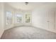 Bright bedroom featuring three windows to let in plenty of natural light at 3820 Preserve Crossing Ln, Cumming, GA 30040