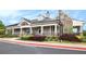 Charming clubhouse with inviting front porch, stone accents, and landscaped grounds at 3820 Preserve Crossing Ln, Cumming, GA 30040