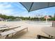 Expansive community pool area with a splash zone and various lounge seating options at 3820 Preserve Crossing Ln, Cumming, GA 30040