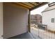 Private balcony with wooden decking and views of the surrounding neighborhood at 550 Fisher Dr # 47, Alpharetta, GA 30009