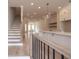 Bright and open kitchen with white cabinets, island, and hardwood flooring at 550 Fisher Dr # 47, Alpharetta, GA 30009