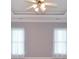 Empty room with white trim, neutral walls, and a ceiling fan at 1570 Woodberry Run Dr, Snellville, GA 30078