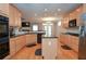 Spacious kitchen with granite countertops, stainless steel appliances, and center island at 1570 Woodberry Run Dr, Snellville, GA 30078