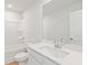 Well-lit bathroom featuring a vanity with a large mirror and a shower-tub combo at 2853 Bullfrog Ln # 172, Gainesville, GA 30115