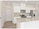 Bright, modern kitchen with granite countertops, stainless steel appliances, and ample storage at 2853 Bullfrog Ln # 172, Gainesville, GA 30115