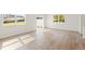 Bright living room with natural light, a sliding glass door, and hardwood floors at 2853 Bullfrog Ln # 172, Gainesville, GA 30115
