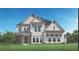 Beautiful two-story home featuring white brick, dormers and a well-manicured lawn at 3010 Florence St, Cumming, GA 30041
