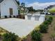 Outdoor kitchen featuring built-in grill and concrete patio at 3010 Florence St, Cumming, GA 30041