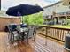 Back deck with patio furniture and grill at 2145 Coventry Dr, Brookhaven, GA 30319
