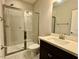 Bathroom with a glass shower, toilet and vanity at 2145 Coventry Dr, Brookhaven, GA 30319