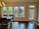 A dining room featuring a large dining table and view of the outdoor patio at 2145 Coventry Dr, Brookhaven, GA 30319