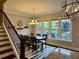 A dining room featuring a large dining table and view of the outdoor patio at 2145 Coventry Dr, Brookhaven, GA 30319