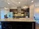 Modern kitchen with stainless steel appliances, granite countertops, and pendant lighting at 2145 Coventry Dr, Brookhaven, GA 30319