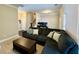 Spacious living room with plush sectional sofa and view of the staircase at 2145 Coventry Dr, Brookhaven, GA 30319