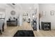 Elegant foyer with hardwood floors, decorative wall trim, and stylish furnishings at 361 Traditions Ln, Hampton, GA 30228