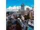 Breathtaking daytime aerial view showcases skyline and surrounding cityscape at 400 W Peachtree Nw St # 3412, Atlanta, GA 30308