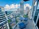 Enjoy city views from this cozy balcony with table and chairs at 400 W Peachtree Nw St # 3412, Atlanta, GA 30308