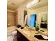Bathroom featuring granite countertops and tile flooring at 400 W Peachtree Nw St # 3412, Atlanta, GA 30308