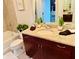 Bathroom featuring granite countertops, a modern sink and decorative plants at 400 W Peachtree Nw St # 3412, Atlanta, GA 30308