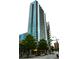 Modern high-rise building exterior, featuring expansive balconies and a sleek design, near Ted Turner Drive at 400 W Peachtree Nw St # 3412, Atlanta, GA 30308