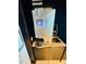 A state of the art coffee machine featuring a built in sink in a dark cabinet at 400 W Peachtree Nw St # 3412, Atlanta, GA 30308