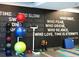 Gym with motivational wall art, exercise balls, scale, yoga mat and various free weights at 400 W Peachtree Nw St # 3412, Atlanta, GA 30308