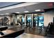 Modern gym featuring weight machines and free weights, with rubber flooring and mirrored walls at 400 W Peachtree Nw St # 3412, Atlanta, GA 30308