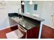 Close up on kitchen island with granite counter, stainless dishwasher and double sink basin at 400 W Peachtree Nw St # 3412, Atlanta, GA 30308