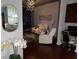 Cozy living room featuring a modern chandelier, plush seating, and views of the city lights at 400 W Peachtree Nw St # 3412, Atlanta, GA 30308