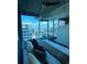 Modern primary bedroom with floor to ceiling windows and expansive balcony at 400 W Peachtree Nw St # 3412, Atlanta, GA 30308
