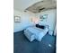 Modern primary bedroom featuring a ceiling fan, textured ceiling and stylish decor at 400 W Peachtree Nw St # 3412, Atlanta, GA 30308