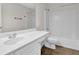 Bathroom with a single sink vanity, tiled floor and combined shower and tub at 5891 Buckner Creek Dr, Mableton, GA 30126