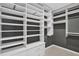 Walk-in closet with custom shelving and ample storage space at 5891 Buckner Creek Dr, Mableton, GA 30126