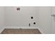 Functional laundry area with tile flooring, and washer-dryer hookups at 5891 Buckner Creek Dr, Mableton, GA 30126