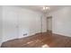 Empty bedroom with hardwood floors, closet, and a ceiling fan at 804 Brookdale Sw Dr, Atlanta, GA 30315