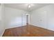Bedroom with a ceiling fan and gleaming hardwood floors at 804 Brookdale Sw Dr, Atlanta, GA 30315