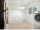 Cozy breakfast area includes a modern washing machine and refrigerator at 804 Brookdale Sw Dr, Atlanta, GA 30315