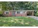 Charming single-story brick house featuring a well-maintained lawn and a convenient covered carport at 804 Brookdale Sw Dr, Atlanta, GA 30315